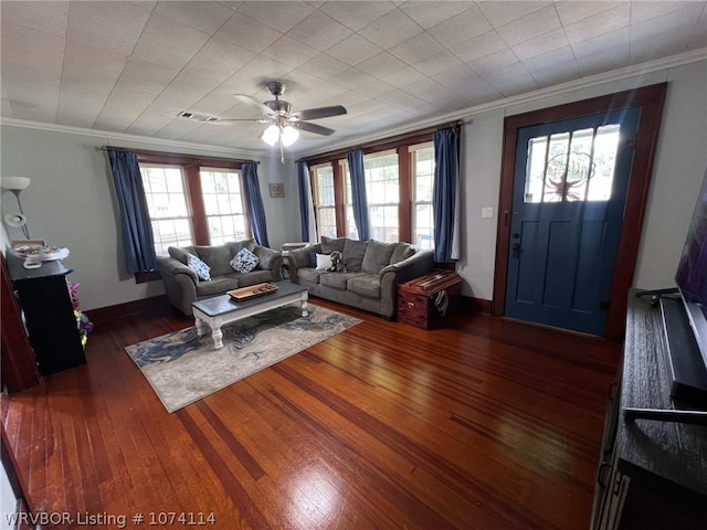 living room featuring ceiling fan, dark hardwood / wood-style flooring, crown molding, and a wealth of natural light