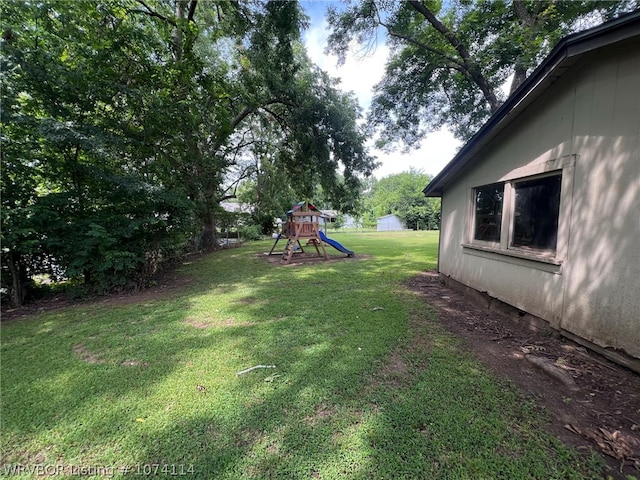 view of yard with a playground