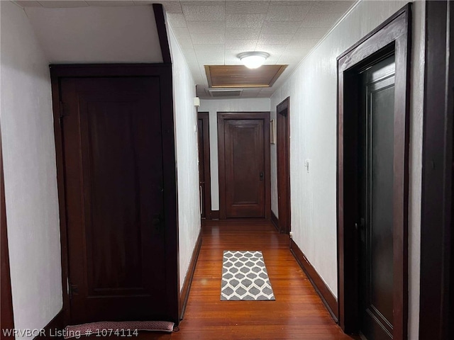 hallway featuring hardwood / wood-style floors