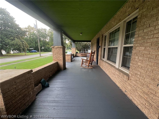 view of patio featuring a porch