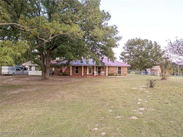 view of front of home with a front yard