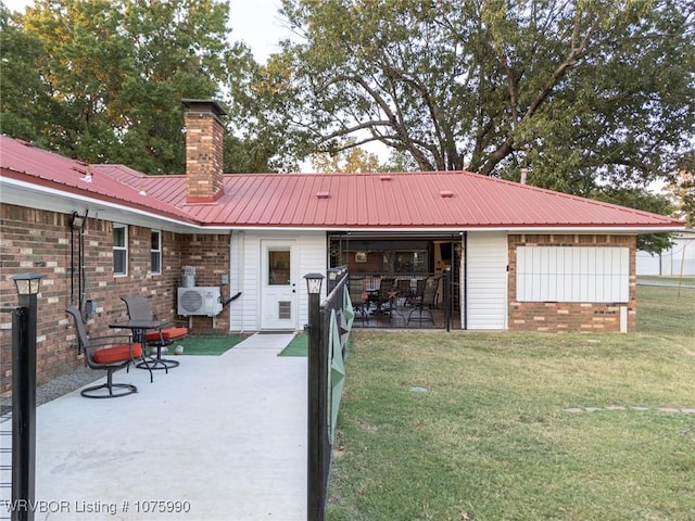 exterior space with a lawn