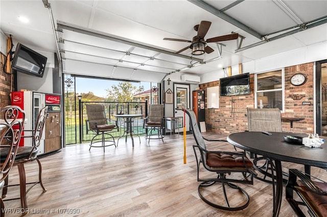 interior space featuring ceiling fan and an AC wall unit