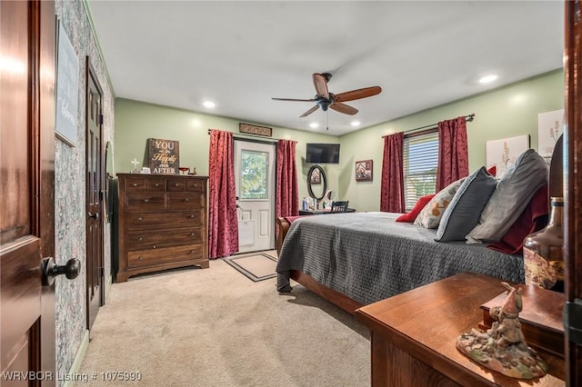 carpeted bedroom featuring ceiling fan