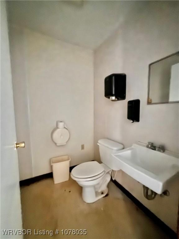 bathroom with toilet and sink