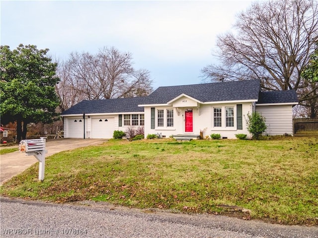 single story home featuring a garage and a front lawn