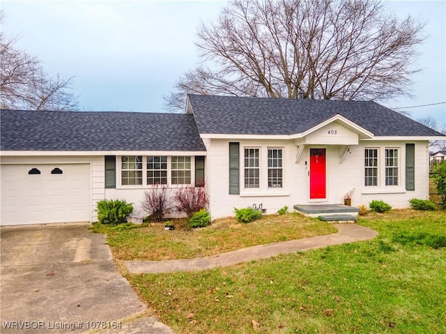 ranch-style house with a garage and a front lawn