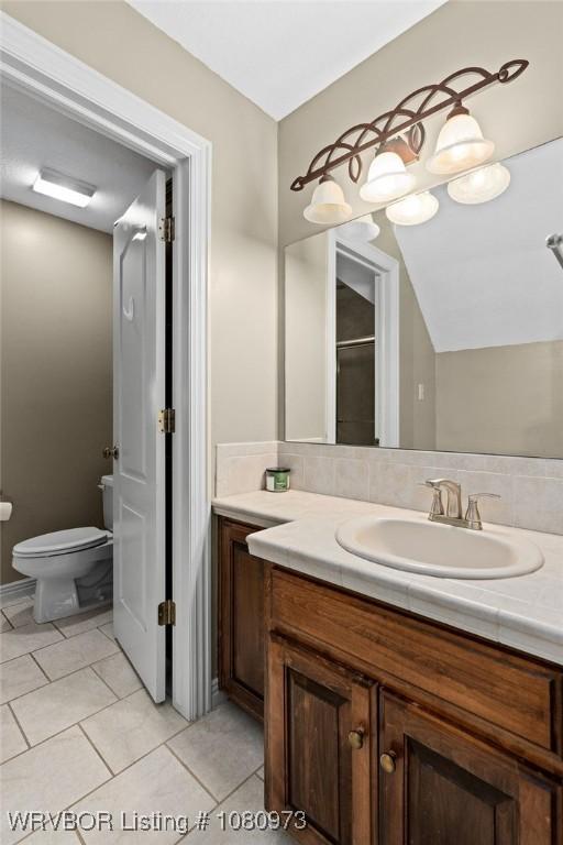 6800 Highland Park Dr, Fort Smith, AR 72916 - bathroom with vanity, toilet, and tile patterned floors