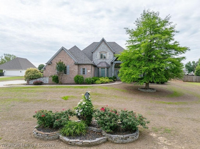 6800 Highland Park Dr, Fort Smith, AR 72916 - view of front of property featuring brick siding, stone siding, and roof with shingles