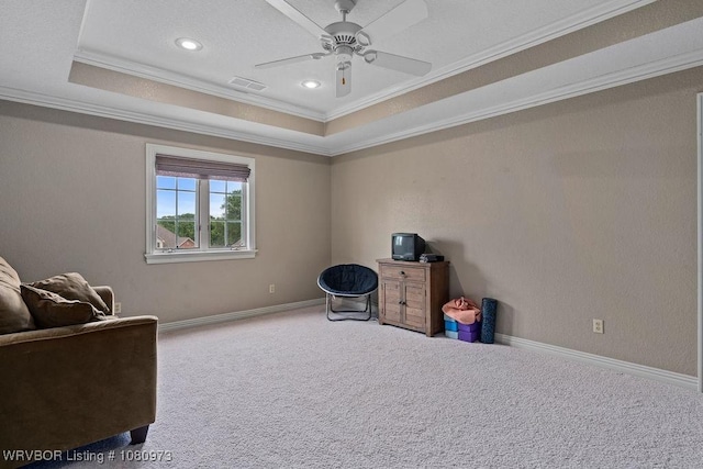 6800 Highland Park Dr, Fort Smith, AR 72916 - sitting room featuring carpet floors, crown molding, a tray ceiling, a ceiling fan, and baseboards