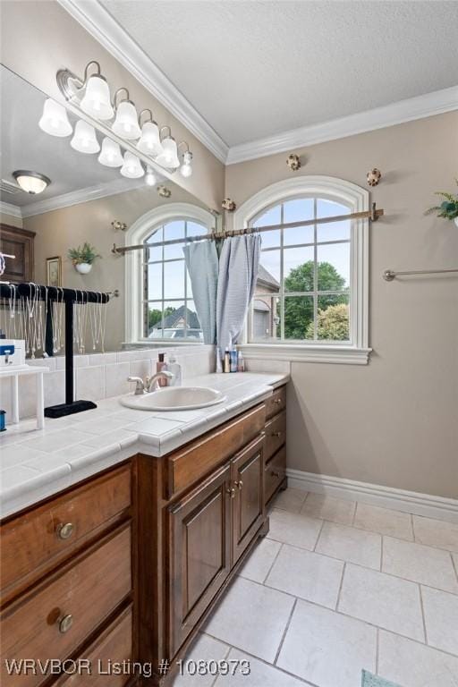 6800 Highland Park Dr, Fort Smith, AR 72916 - bathroom featuring vanity, ornamental molding, baseboards, and tile patterned flooring