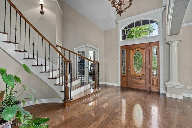 6800 Highland Park Dr, Fort Smith, AR 72916 - entrance foyer with a high ceiling, ornate columns, baseboards, and stairway