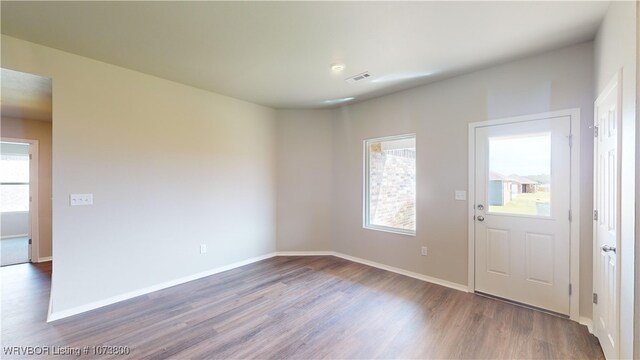 interior space with dark wood-type flooring