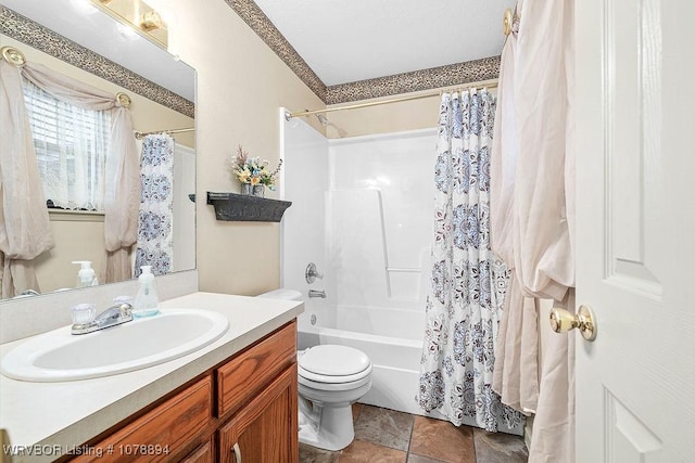 full bathroom with vanity, toilet, and shower / bath combo with shower curtain