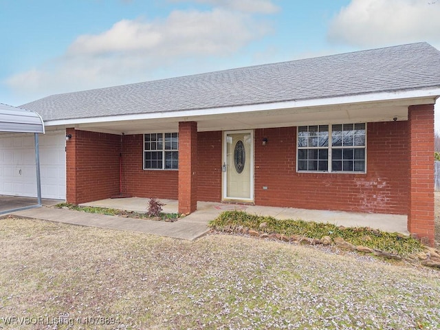 single story home with a garage