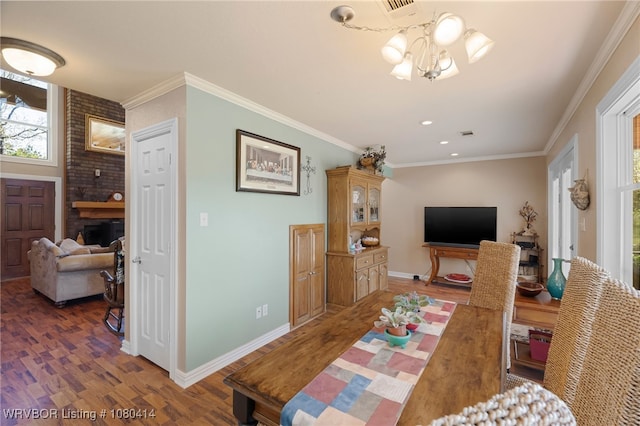 7441 Valley Creek Rd, Cecil, AR 72930 - dining space with wood finished floors, baseboards, ornamental molding, and an inviting chandelier