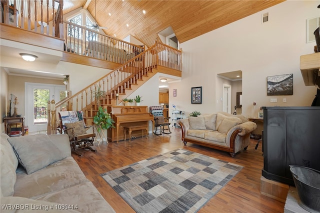 7441 Valley Creek Rd, Cecil, AR 72930 - living room featuring wood ceiling, wood finished floors, high vaulted ceiling, and stairway