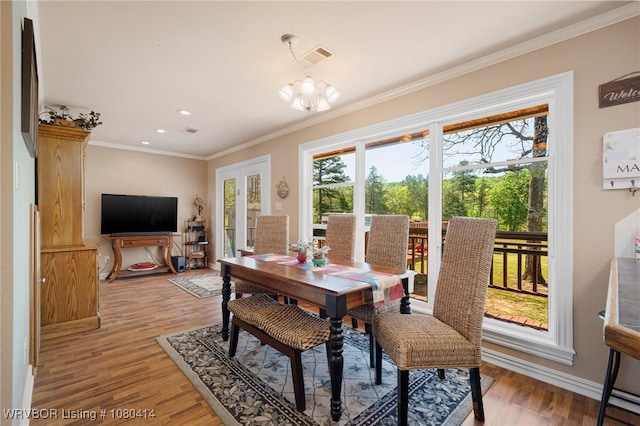 7441 Valley Creek Rd, Cecil, AR 72930 - dining area with crown molding, light wood-style floors, baseboards, a notable chandelier, and recessed lighting