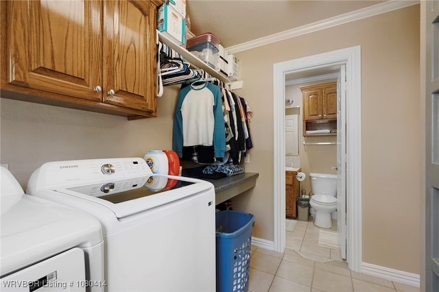 7441 Valley Creek Rd, Cecil, AR 72930 - laundry area featuring ornamental molding, light tile patterned flooring, baseboards, separate washer and dryer, and cabinet space