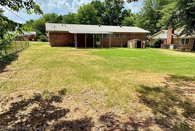 view of yard with a storage shed