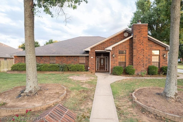 view of front facade with a front yard