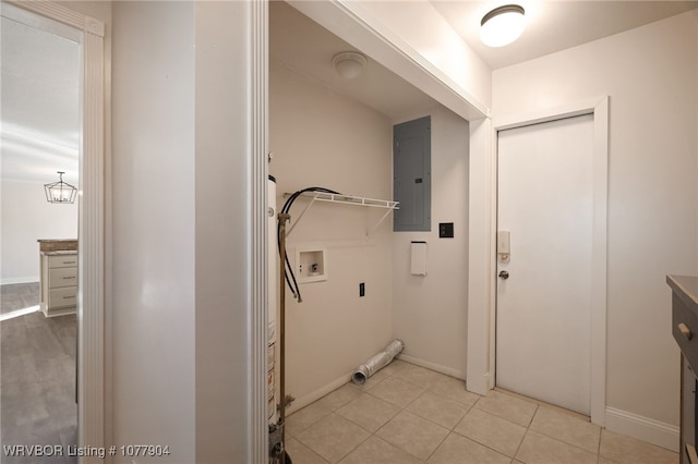 laundry area featuring electric panel, hookup for a washing machine, light tile patterned floors, and a chandelier