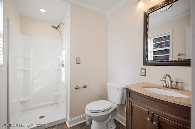 bathroom with vanity, crown molding, a shower, and toilet