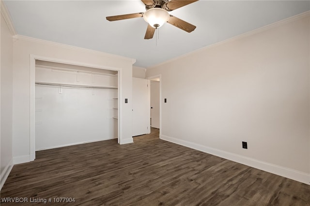 unfurnished bedroom with a closet, dark wood-type flooring, ceiling fan, and ornamental molding