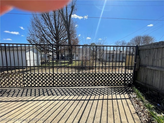 wooden deck with a gate and fence