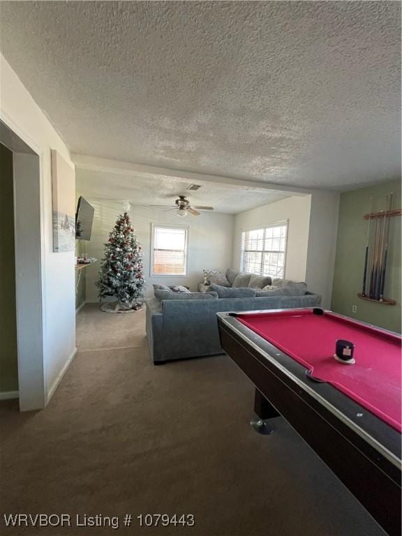 recreation room featuring ceiling fan, a textured ceiling, carpet floors, pool table, and visible vents