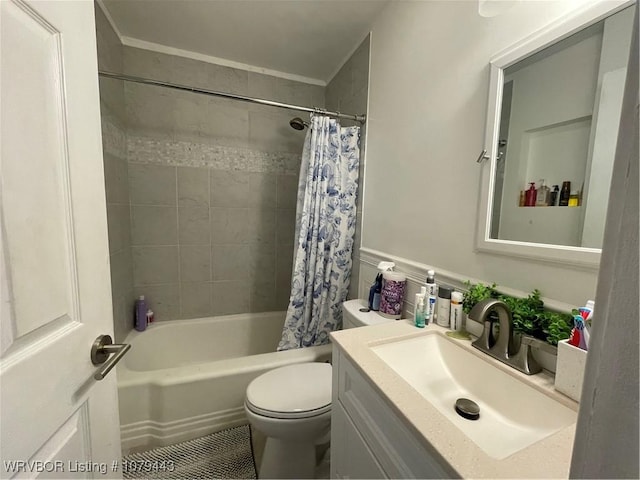 full bath with vanity, toilet, and shower / bath combo with shower curtain