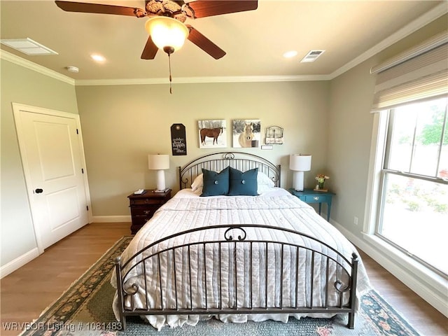 3414 Bugscuffle Rd, Lavaca, AR 72941 - bedroom featuring wood finished floors, crown molding, recessed lighting, and ceiling fan