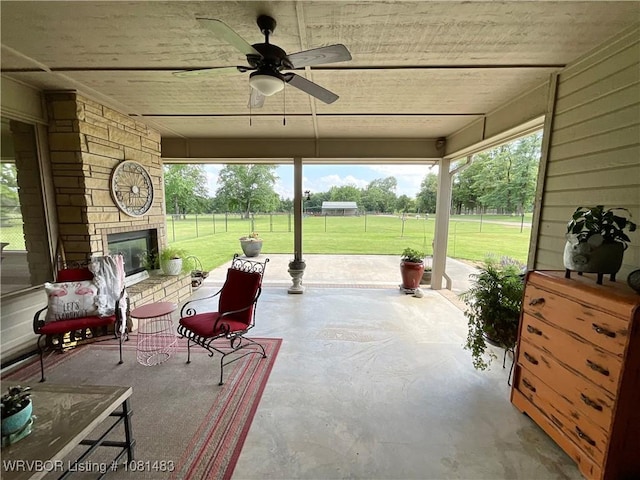 3414 Bugscuffle Rd, Lavaca, AR 72941 - view of patio / terrace with an outdoor stone fireplace and ceiling fan