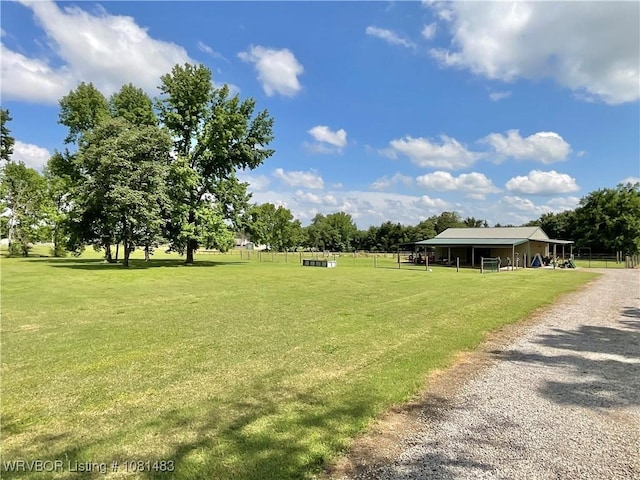 3414 Bugscuffle Rd, Lavaca, AR 72941 - view of yard featuring driveway, a pole building, and an outbuilding