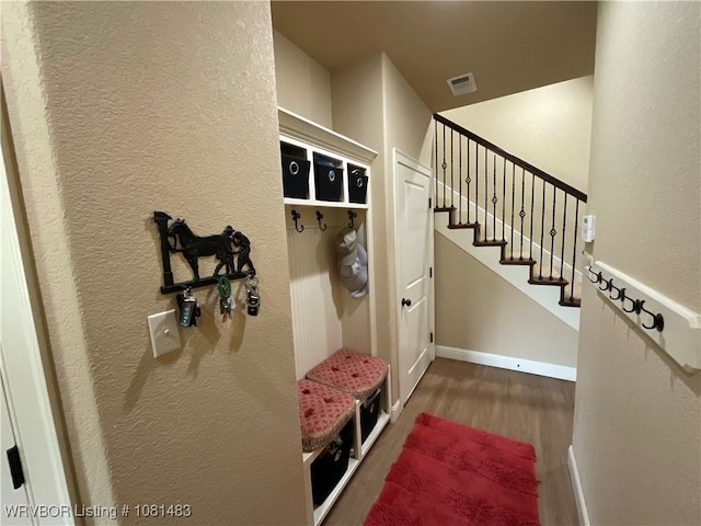 3414 Bugscuffle Rd, Lavaca, AR 72941 - mudroom with wood finished floors and a textured wall
