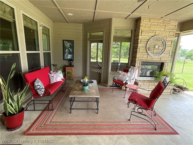 3414 Bugscuffle Rd, Lavaca, AR 72941 - view of patio with an outdoor living space with a fireplace