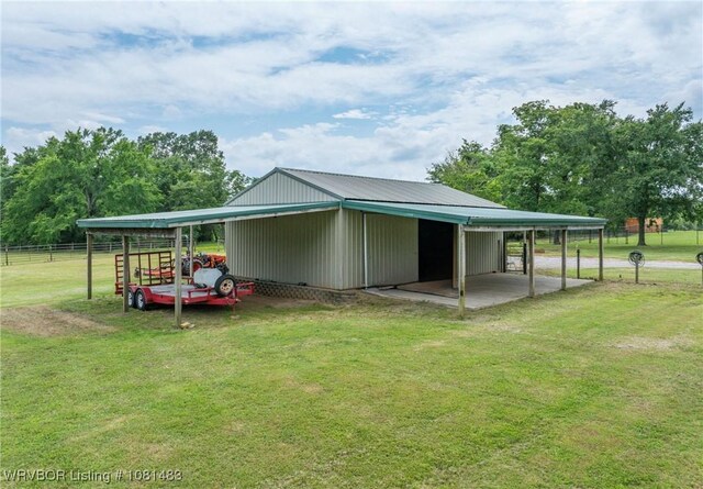 3414 Bugscuffle Rd, Lavaca, AR 72941 - view of home's exterior featuring a pole building and an outbuilding