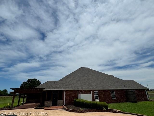 exterior space with a front yard