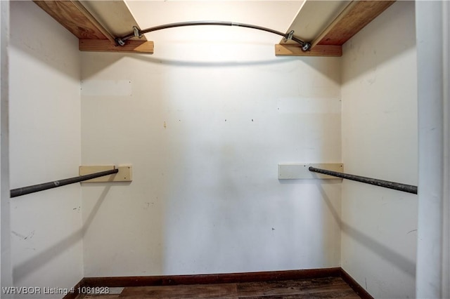 1141 Mountain Grove Ter, Alma, AR 72921 - walk in closet with dark wood-style floors