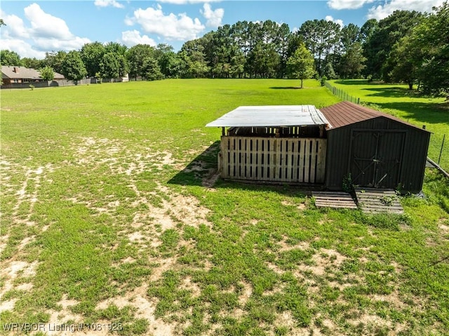 1141 Mountain Grove Ter, Alma, AR 72921 - view of green lawn with an outdoor structure and view of wooded area