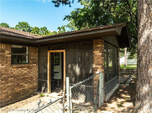 1141 Mountain Grove Ter, Alma, AR 72921 - view of side of property with brick siding and a sunroom