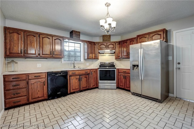 1141 Mountain Grove Ter, Alma, AR 72921 - kitchen with appliances with stainless steel finishes, under cabinet range hood, light countertops, brick patterned floors, and a chandelier