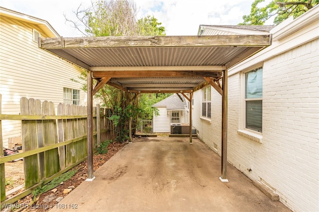 2113 S V St, Fort Smith, AR 72901 - view of patio featuring central air condition unit and an attached carport