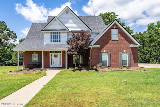 3637 Marshall Cir, Van Buren, AR 72956 - traditional-style house with a front lawn, brick siding, a shingled roof, and a porch