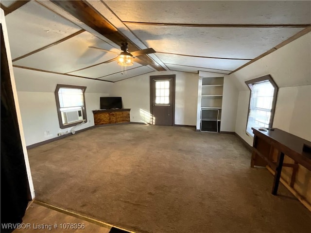 additional living space featuring cooling unit, ceiling fan, carpet flooring, and vaulted ceiling