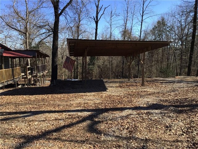 view of yard featuring a carport