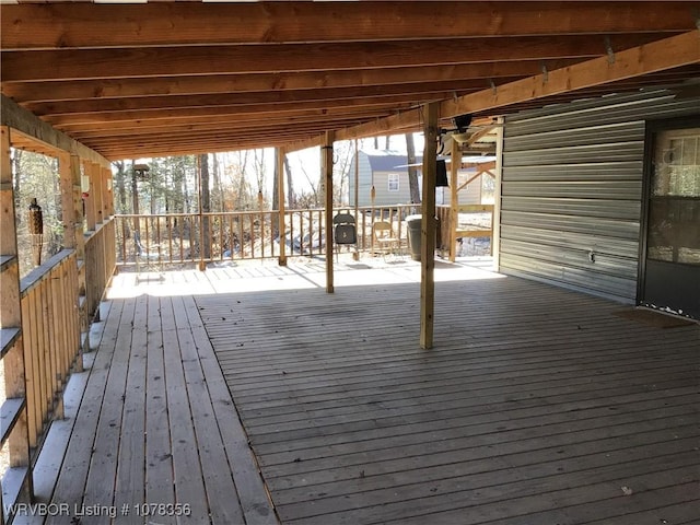 view of snow covered deck