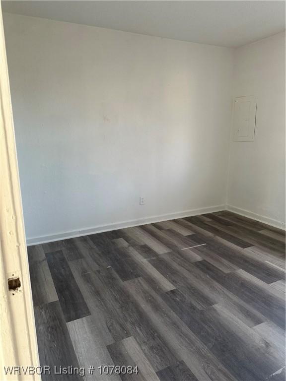 empty room featuring dark hardwood / wood-style floors