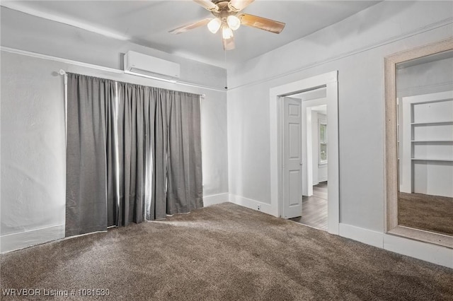 701 Witte St, Poteau, OK 74953 - carpeted empty room with a wall mounted air conditioner and a ceiling fan