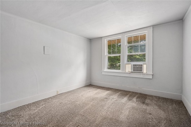 701 Witte St, Poteau, OK 74953 - carpeted spare room featuring baseboards and cooling unit